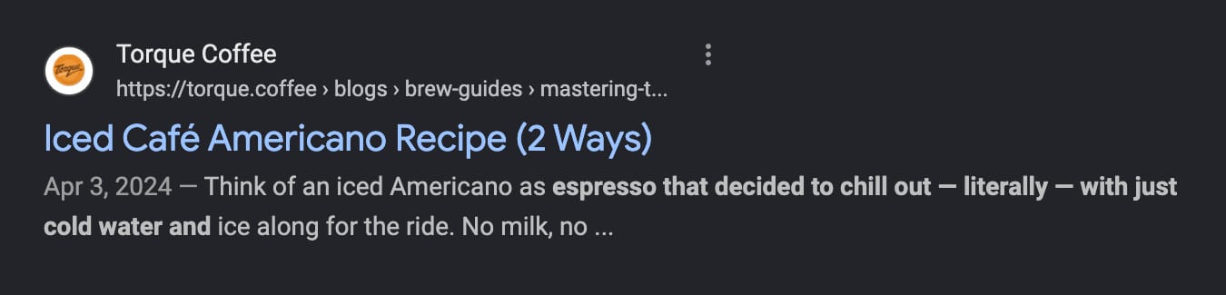 SERP excerpt for iced americano showing Torque's organic ranking for Iced Cafe Americano Recipe (2 Ways)